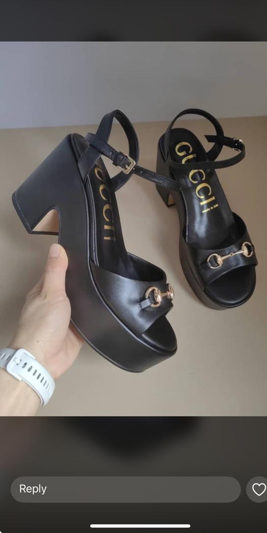 Black Gucci sandals